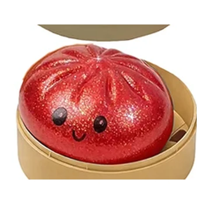 Bao Cinabre : squishy bao rouge minéral aux éclats pailletés.